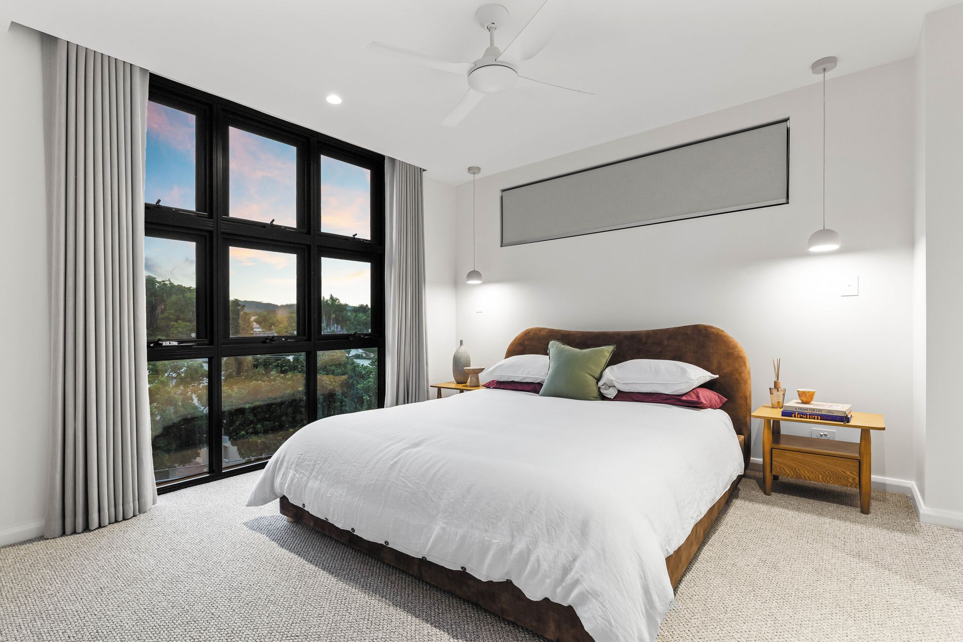 Master bedroom with floor-to-ceiling windows