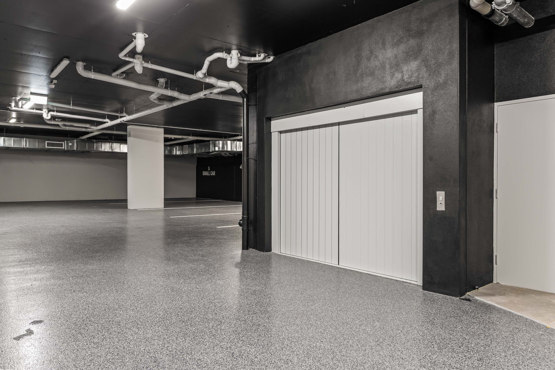 Basement parking and car lift area